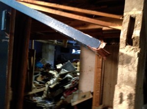 "She came in through the basement window..." Street level window can be seen at the back, as well as Sandy's path as she flooded the storage space in the basement ripping metal doors from their hinges and damaging cement walls.